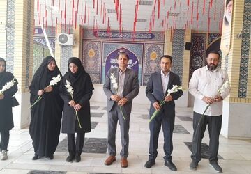 غبارروبی مزار شهدای سیدعباس در روز جهانی سوادآموزی