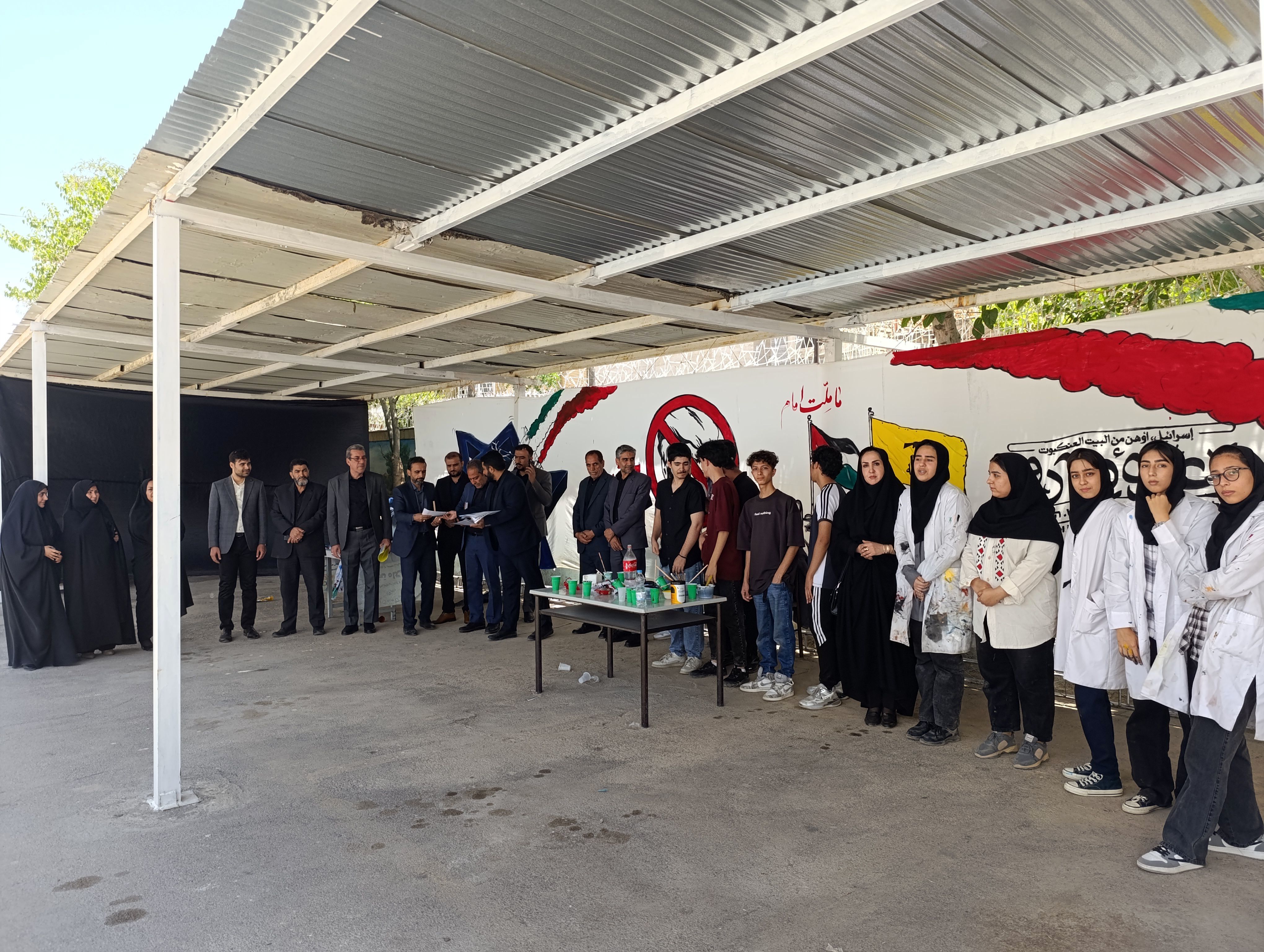 قدردانی از دانش‌آموزان فعال در نمایشگاه نقاشی حماسه حسینی 