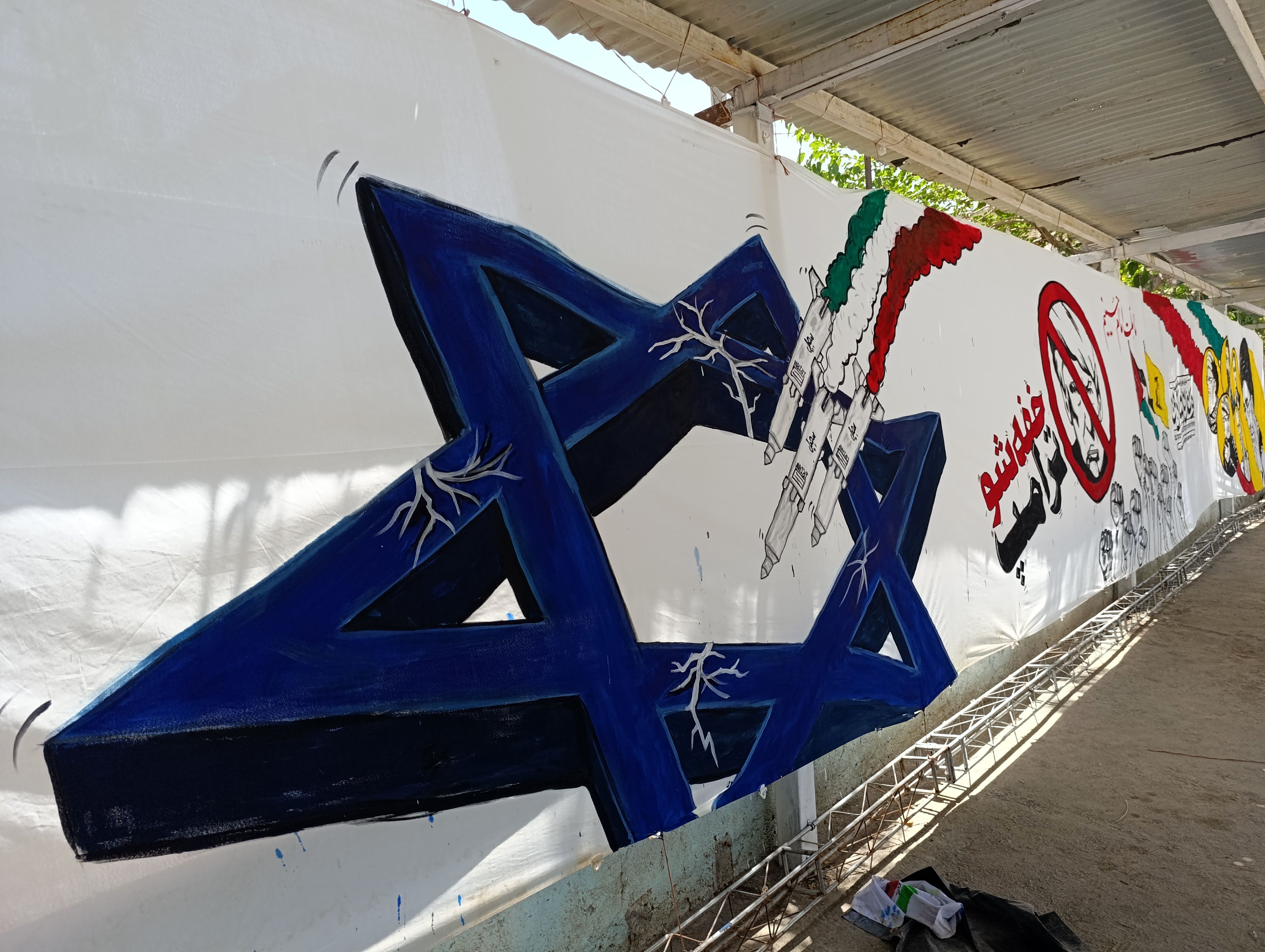 نمایشگاه نقاشی حماسه حسینی در اداره آموزش و پرورش ناحیه ۷ مشهد مقدس