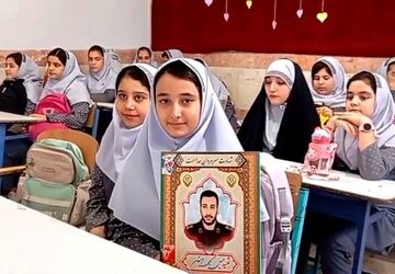 استقبال خادمان رضوی از فرزند شهید در اولین روز حضور در مدرسه