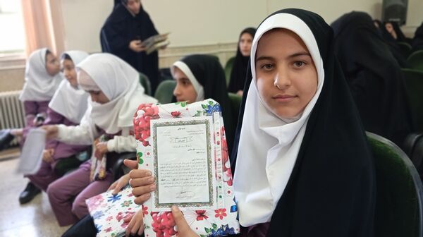 آیین تجلیل از برگزیدگان چهل و سومین دوره مسابقات قرآن، عترت و نماز شهرستان بن