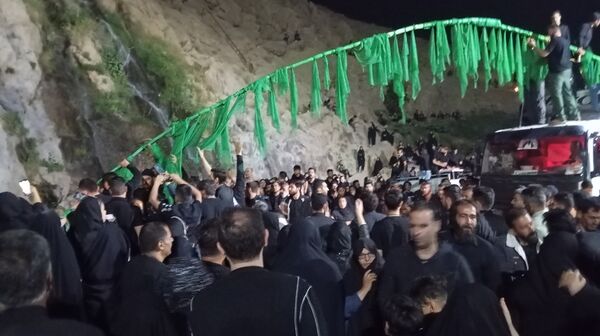 «علم‌ها در آب» سنت عاشورایی مردم بن 