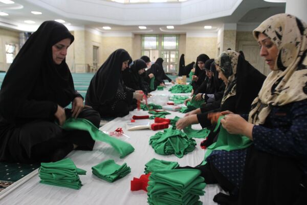 بسته‌بندی لباس همایش شیرخوارگان حسینی زنجان