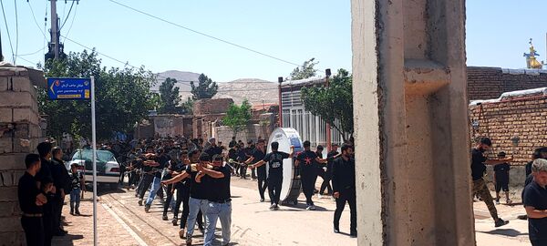 عزاداری ظهر عاشورا در روستای حسن آباد بلهر 