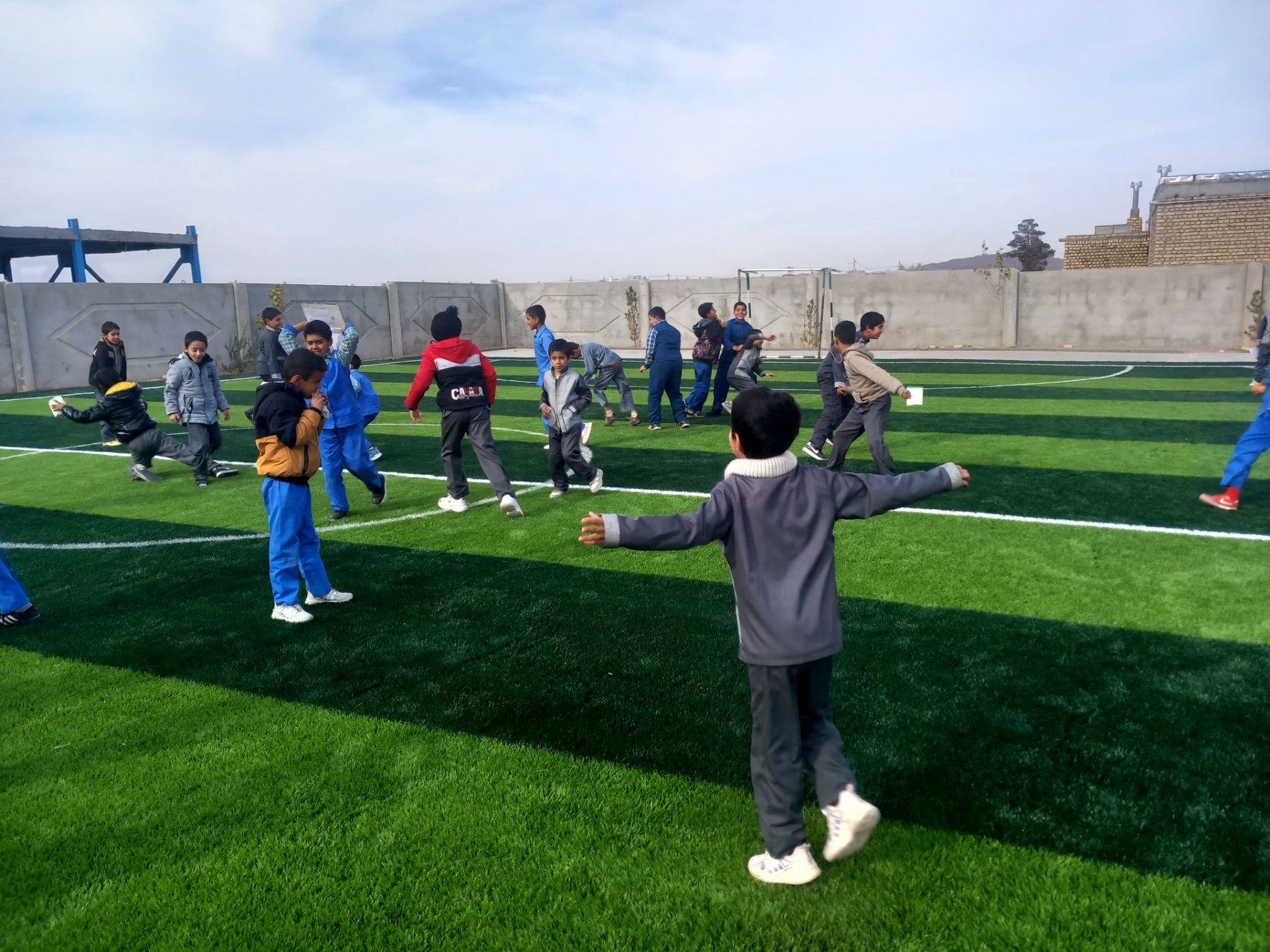 افتتاح زمین چمن مدرسه شهید غلامی خلیل آباد