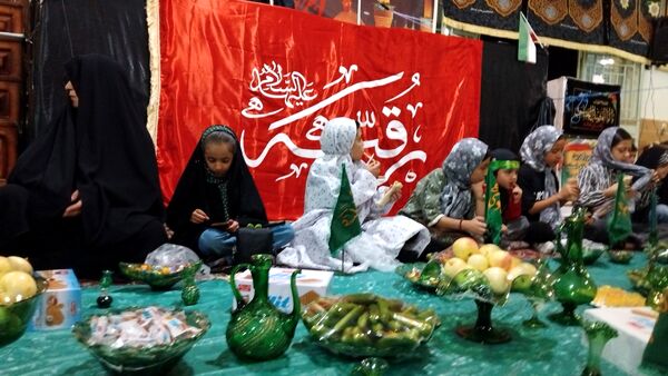 برپایی سفره حضرت‌رقیه (س) در شهر وردنجان