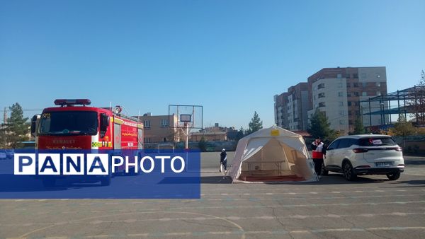 برگزاری بیست و ششمین مانور زلزله در دبستان شهدای فرهنگی