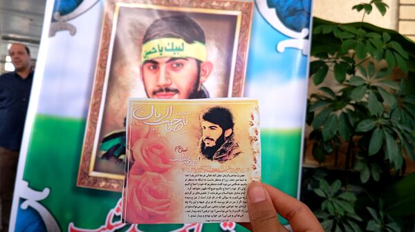 محفل انس با قرآن و یادواره «شهید احمد محمد مشلب» در شهر بن