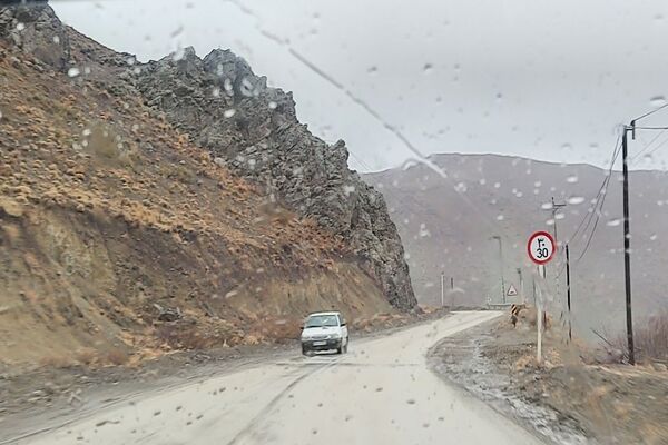 طنین ترانه باران زمستانی در آسمان شهر بار نیشابور 