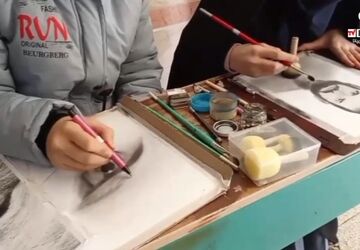 گرامیداشت دهه فجر و برگزاری نمایشگاه آثار هنری در مدرسه شهدای شلمچه ۲