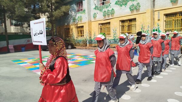 مشعل المپیاد ورزشی ناحیه ۷ در دبستان شهدای راه آهن روشن شد