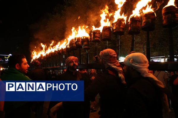 آیین «مشعل گردانی» نجفی‌های مقیم قم