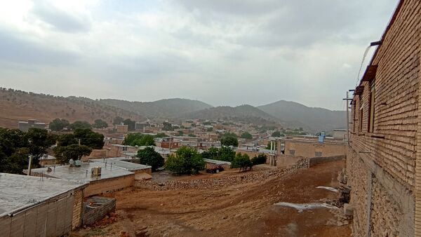 اولین بارش تابستانه در روستای کینک