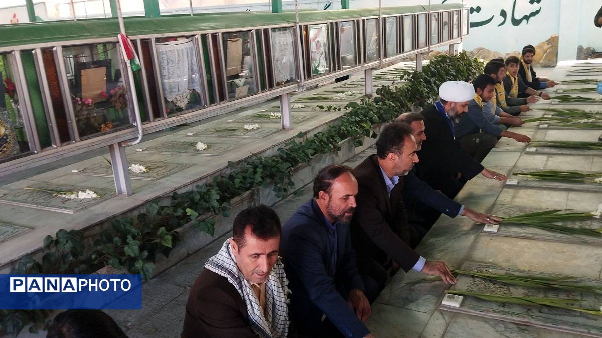 مراسم غبارروبی و عطرافشانی مزار شهدای 400 دستگاه ناحیه 3 کرج در هفته دفاع مقدس