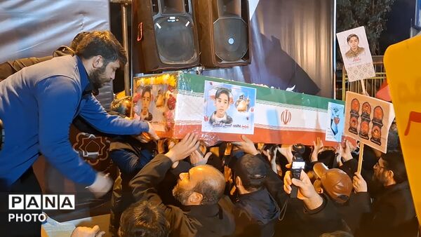 آیین وداع با پیکر دانش آموز شهید محمد حسین دهقان در قم