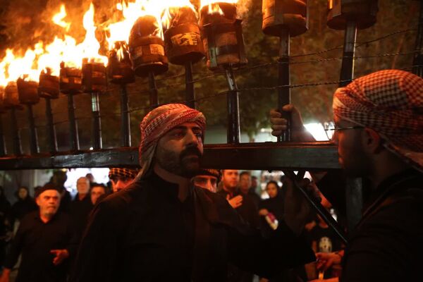 آیین «مشعل گردانی» نجفی‌های مقیم قم