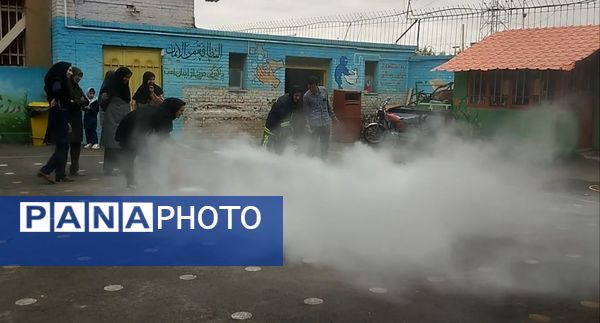 برنامه آموزشی اطفا حریق در مدرسه مهندس رحمانی فرد مشهد