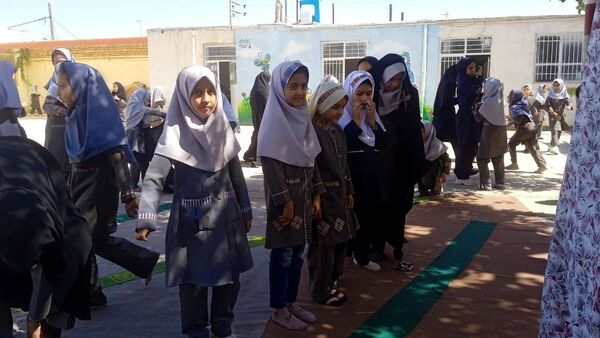 برپایی نماز جماعت  در دبستان شهید نجفی فدافن 