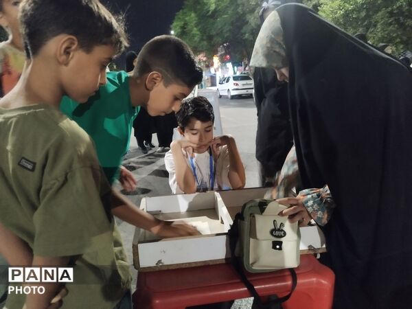 سرگرمی کودکان در غرفه کودک فرهنگیان 