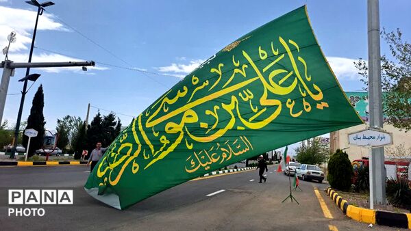 آیین اهتزاز پرچم امام رضا(ع) و رونمایی از دیوارنگاره کودکان میناب در شهر کهک