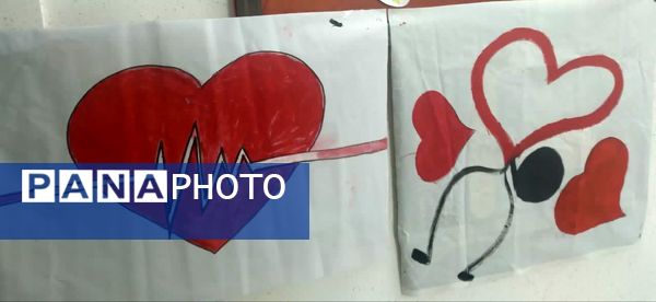 طرح نقاشی گروهی رو پارچه به‌مناسبت روز پرستار در دبستان مبتکران ۳ مشهد