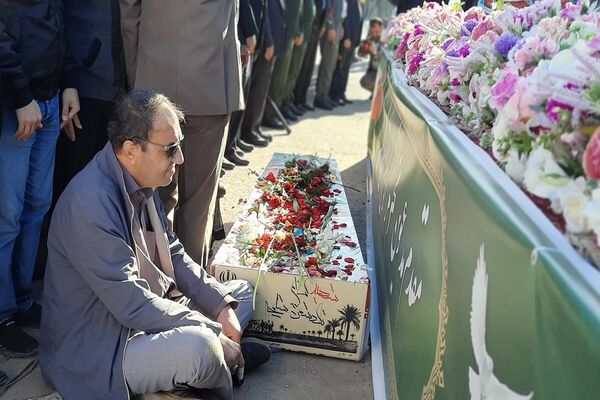 تشییع شهید قهرمان بر دستان پهلوانان خوزستان