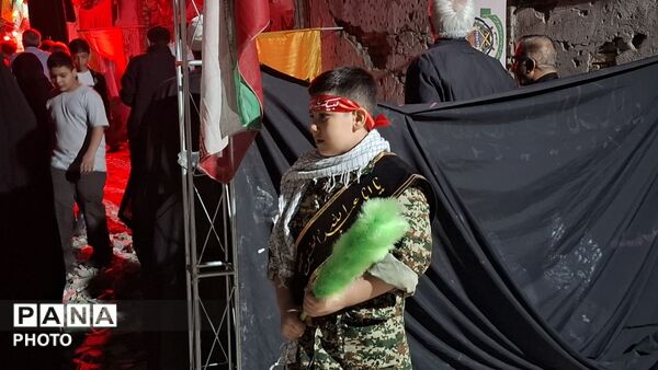 خیابان ایثار در سوگ سردار داود عسگری و خانواده‌ شهیدشان