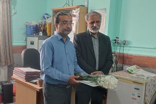 تجلیل از مدیر و کارکنان مدرسه نمونه رازی سعدآباد