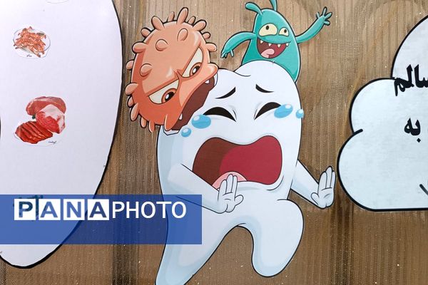 اجرای طرح وارنیش فلوراید برای دانش‌آموزان آموزشگاه باهنر۱ ملارد