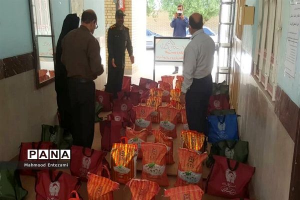 رزمایش کمک مومنانه دانش‌آموزان و فرهنگیان آب پخش