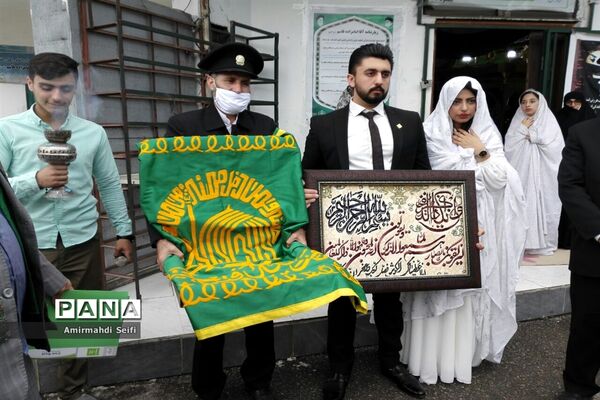 گرداندن پرچم مقدس آستان قدس رضوی در شهرستان محمودآباد