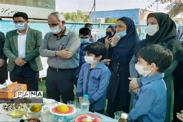 نواختن زنگ نمادین آزمایشگاه در شهرستان امیدیه