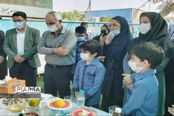 نواختن زنگ نمادین آزمایشگاه در شهرستان امیدیه
