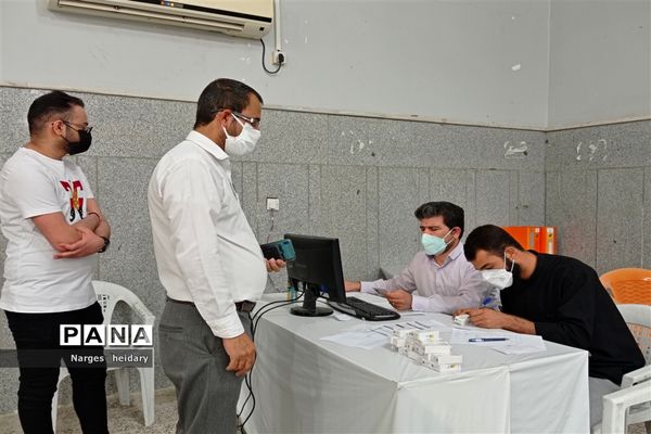 افتتاح دومین سالن  تجمیعی واکسن کرونا در مدرسه شهید رحیمی امیدیه