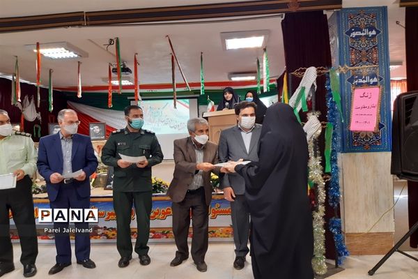 نواختن زنگ ایثار و شهادت  را مدرسه شهدای اقتدار ملارد