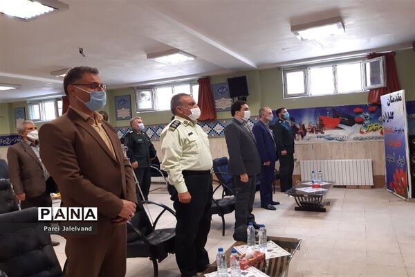 نواختن زنگ ایثار و شهادت  را مدرسه شهدای اقتدار ملارد