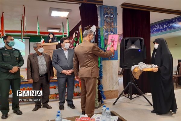 نواختن زنگ ایثار و شهادت  را مدرسه شهدای اقتدار ملارد