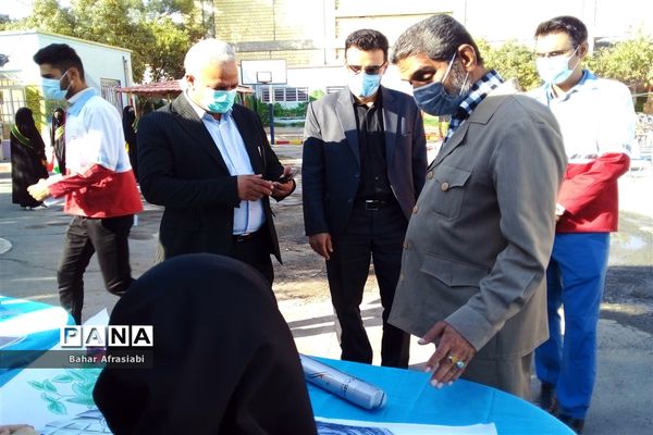 نواختن زنگ ایثار در دبیرستان شاهد بهشت رباط کریم