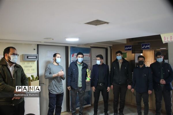 تکریم از مقام شهدای مدافع سلامت و تجلیل از کادر بهداشت و درمان