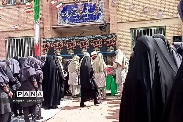 مراسم استقبال دانش‌آموزان از پیکر شهید گمنام در دبیرستان مسلم بن عوسجه  پردیس