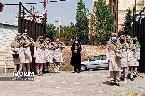 مراسم استقبال دانش‌آموزان از پیکر شهید گمنام در دبیرستان مسلم بن عوسجه  پردیس