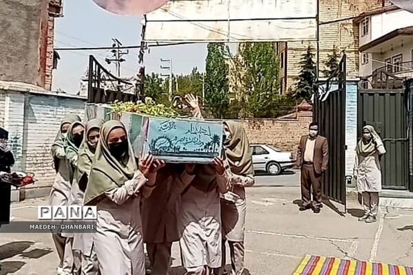 مراسم استقبال دانش‌آموزان از پیکر شهید گمنام در دبیرستان مسلم بن عوسجه  پردیس