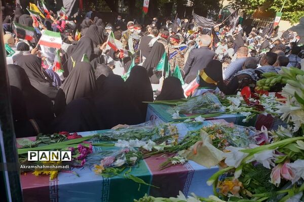 آیین تشییع و تدفین شهدای گمنام دانش‌آموزی در اردوگاه شهید باهنر