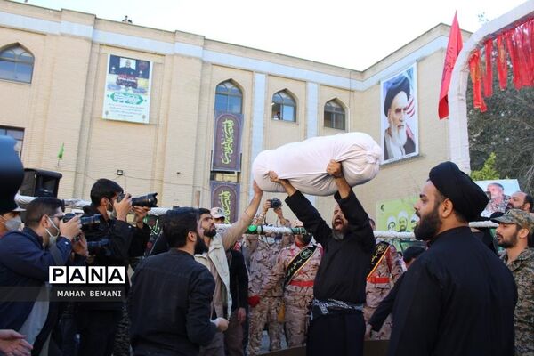خاکسپاری دو شهید گمنام در مدرسه علمیه فاطمی