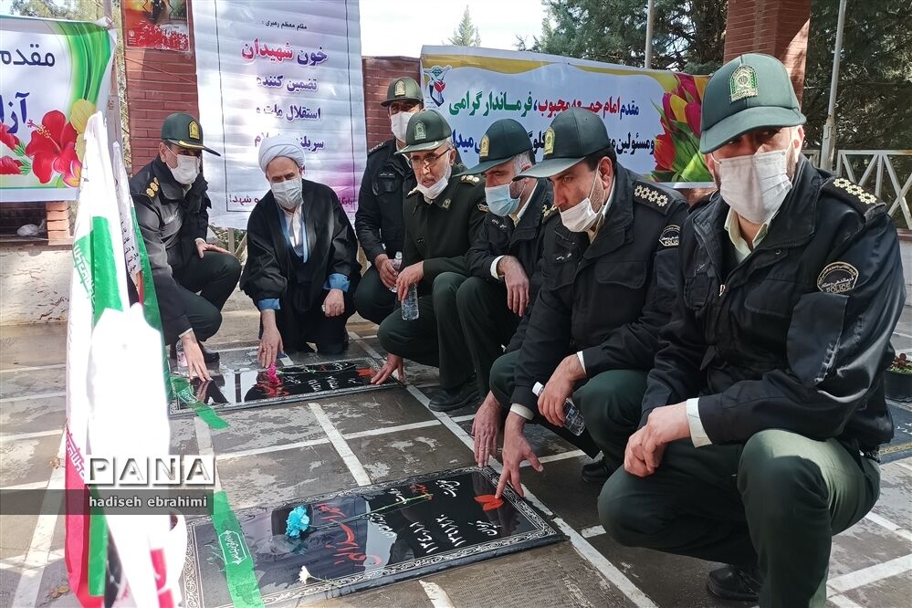 غبارروبی و عطر افشانی گلزار شهدا در گلوگاه