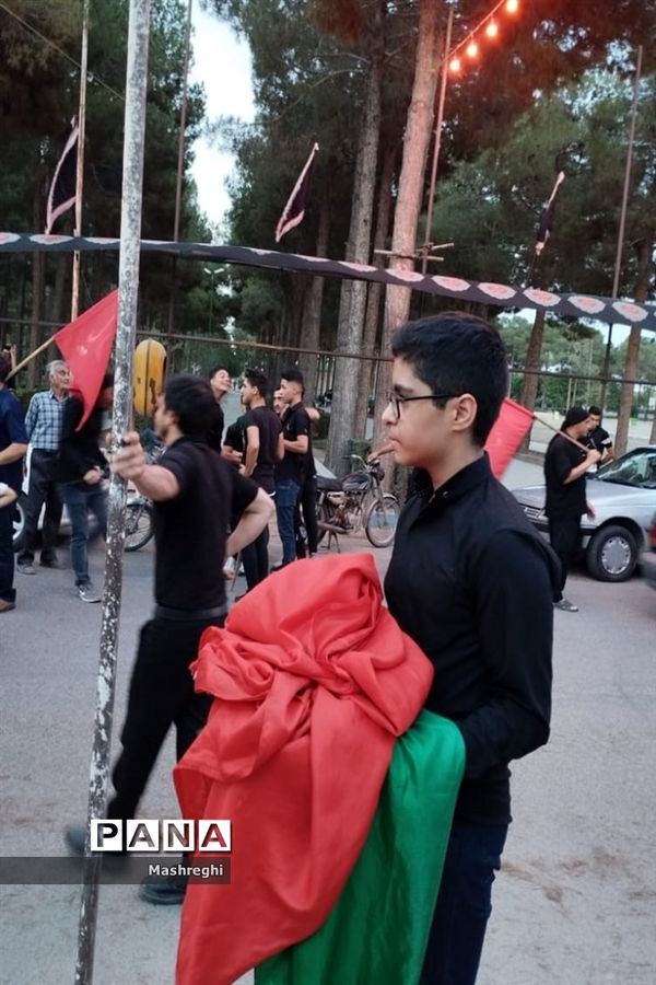 مراسم آیینی پرچم بدستان و بیرق‌داران ندای محرم نوش‌آباد
