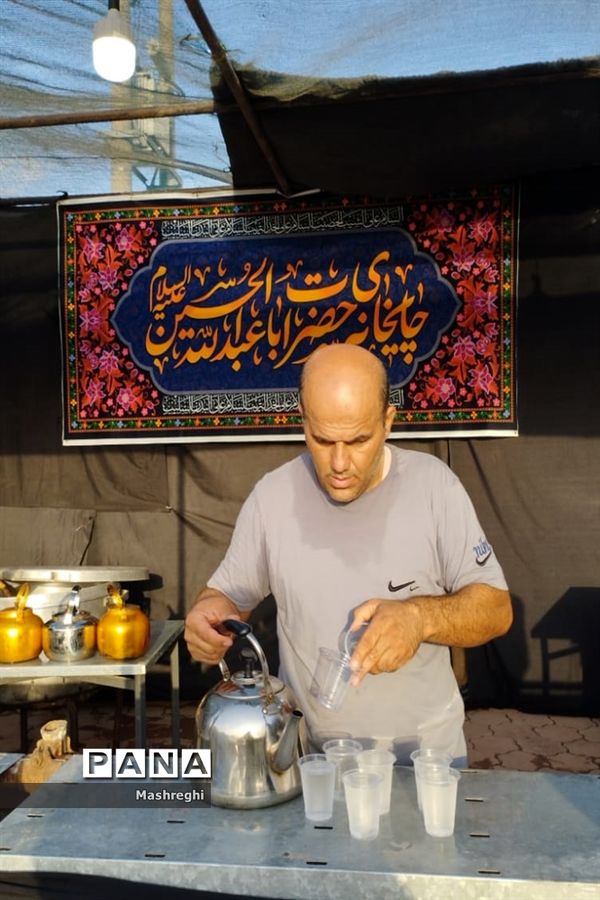 مراسم آیینی پرچم بدستان و بیرق‌داران ندای محرم نوش‌آباد