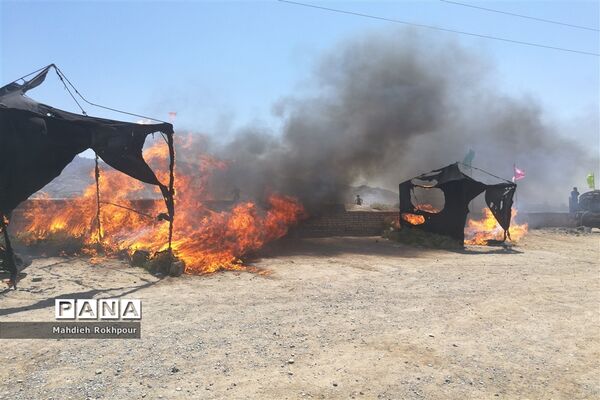 مراسم نمادین ظهر عاشورا در حاجی آباد بیرجند