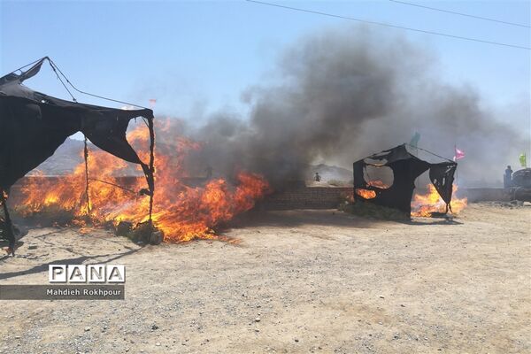 مراسم نمادین ظهر عاشورا در حاجی آباد بیرجند