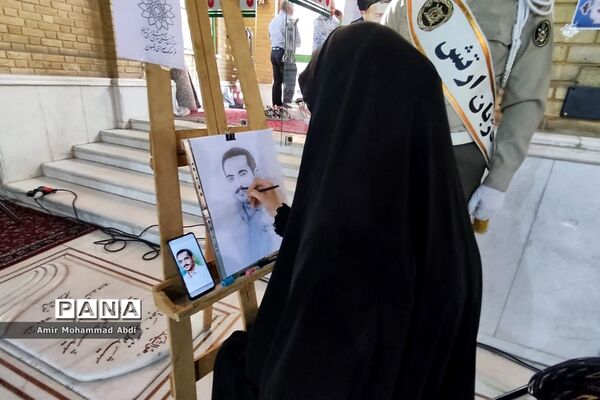 مراسم عطر افشانی وگلریزان مزار مطهر شهدای هشتم شهریور